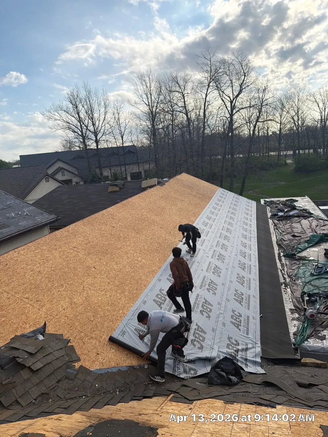 Tarping and dry-in on a Lapel commercial roof
